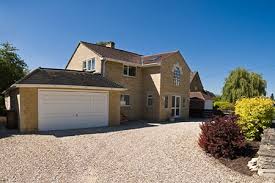 Front of house showing a finished driveway